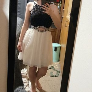 Black and white formal dress.